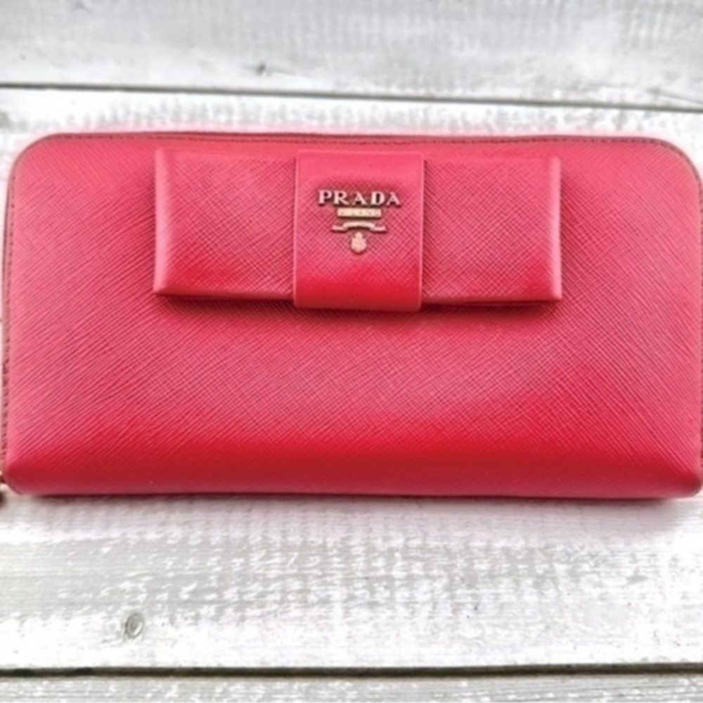 AUTHENTIC Prada Saffiano Fiocco Bow Zip Around Wallet. Color: Peonia.